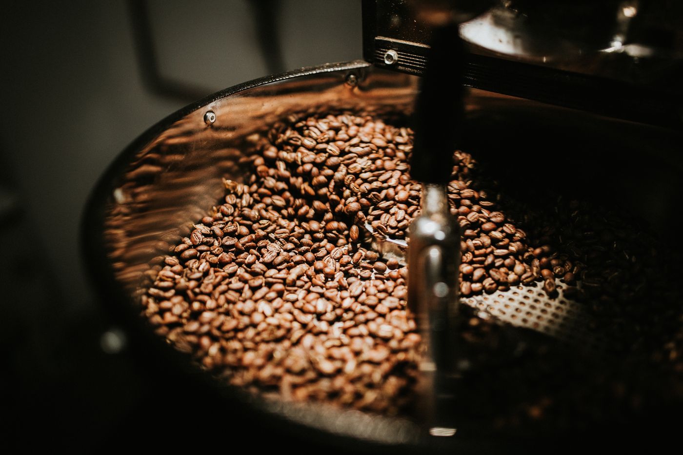 Pour-over dripper with visible water arc during brewing